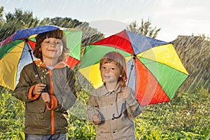 Happy brother with umbrella