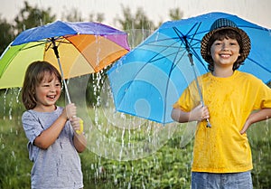 Happy brother with umbrella outdoors