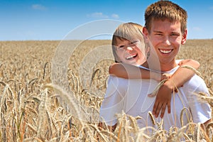 Happy brothers in corn field