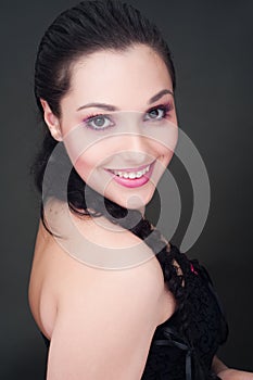 Happy brunette with long plait