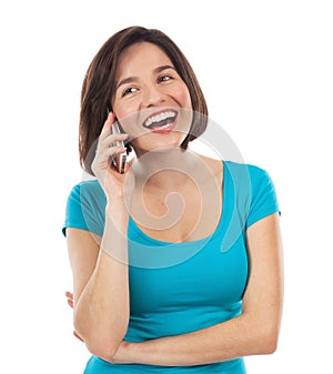 Happy brunette talking on the phone