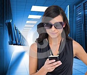 Happy brunette using smartphone