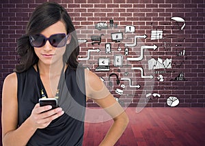 Happy brunette using smartphone