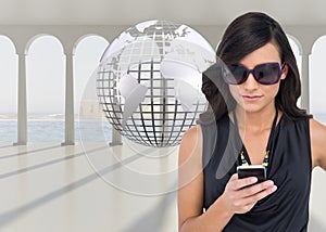 Happy brunette using smartphone