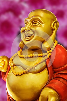 Happy Buddha statue in China town, Manila Philippines, white background