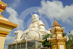 Happy Buddha at Vinh Trang Pagoda in My Tho Vietnam