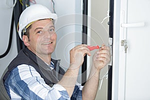 Happy builder installing window