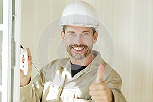 happy builder looking at camera