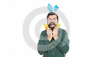 So happy. bunny hunt. just having fun. eastertime. happy holidays. happy bunny guy with carrot. photo