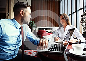 Happy business colleagues in modern office