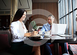 Happy business colleagues in modern office