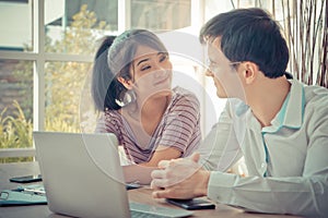 Happy Business Couple working together at home