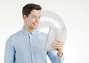 Happy business man using tablet
