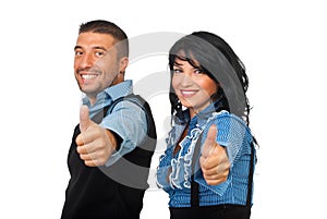 Happy business partners gives thumbs