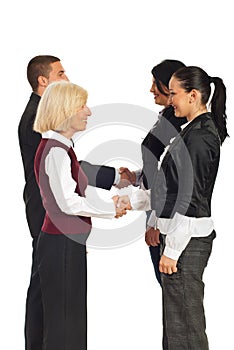 Happy business people handshakes photo