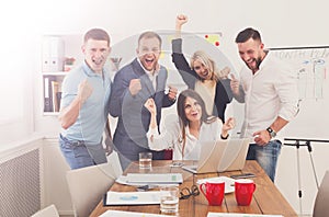 Happy business people team celebrate success in the office