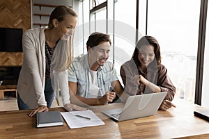 Happy business team watching online training or virtual presentation