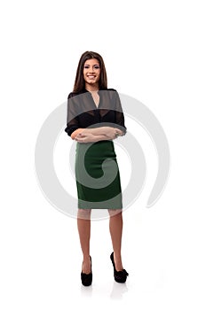 Happy business woman with arms folded isolated on white