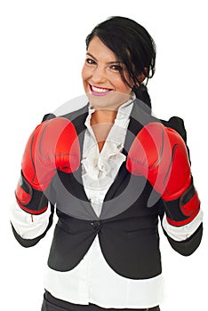 Happy business woman with boxing gloves