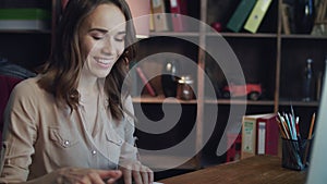 Happy business woman checking report on computer. Business success concept