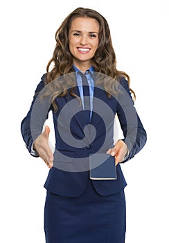 Happy business woman giving passport