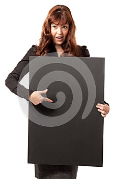 Happy business woman holding a blank billboard