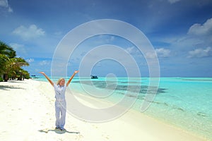 Happy business woman on the ocean coast