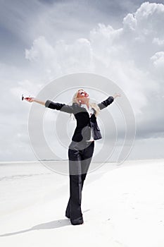 Happy business woman on the ocean coast
