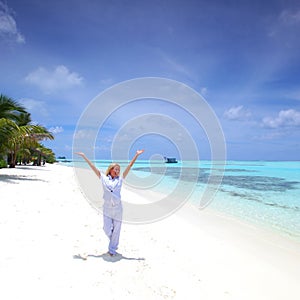 Happy business woman on the ocean coast