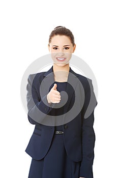 Happy business woman with ok hand sign