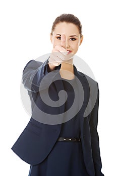 Happy business woman with ok hand sign
