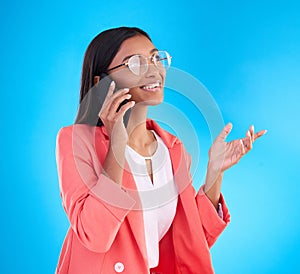 Happy business woman, phone call and conversation for communication or consulting against a blue studio background