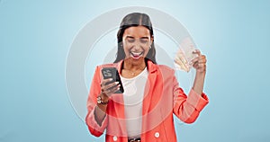 Happy business woman, phone and money fan in financial freedom against a blue studio background. Portrait of excited