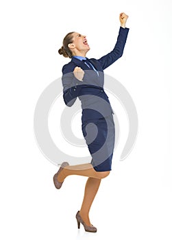 Happy business woman rejoicing success