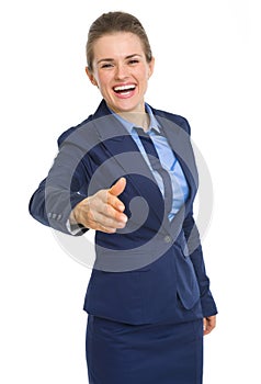 Happy business woman stretching hand for handshake
