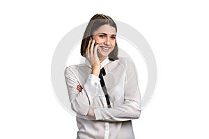 Happy business woman talking on phone.