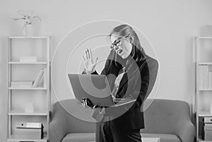 Happy business woman talking on the phone in the office. Portrait of young businesswoman accountant in formal wear at