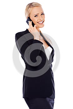 Happy business woman using cell phone