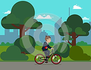 Happy Businessman on bike at park. sports and leisure outdoor activity