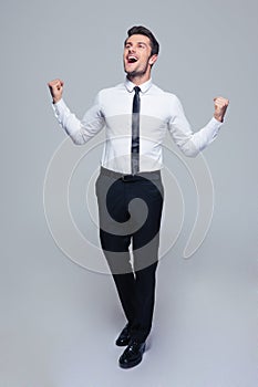 Happy businessman celebrating his success