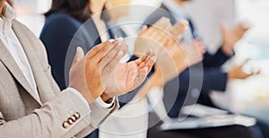 Happy businessman clapping hands for presentation during a meeting in an office boardroom with colleagues. Diverse group