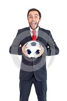 Happy businessman with football