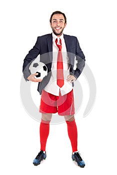 Happy businessman with football