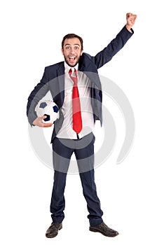 Happy businessman with football