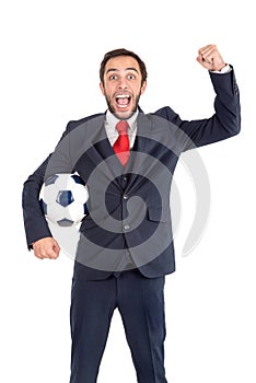 Happy businessman with football