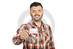 Happy businessman giving blank card photo