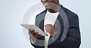 Happy businessman, hands and tablet in social media, research or communication against a studio background. Closeup of