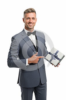 Happy businessman hold present in hand. Generosity concept. Birthday holiday. Shopping mall. Gift package. Womens day