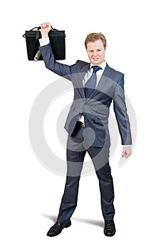 Happy businessman holding brief case