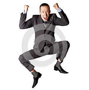 Happy businessman jumping